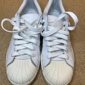 All white adidas shell toes